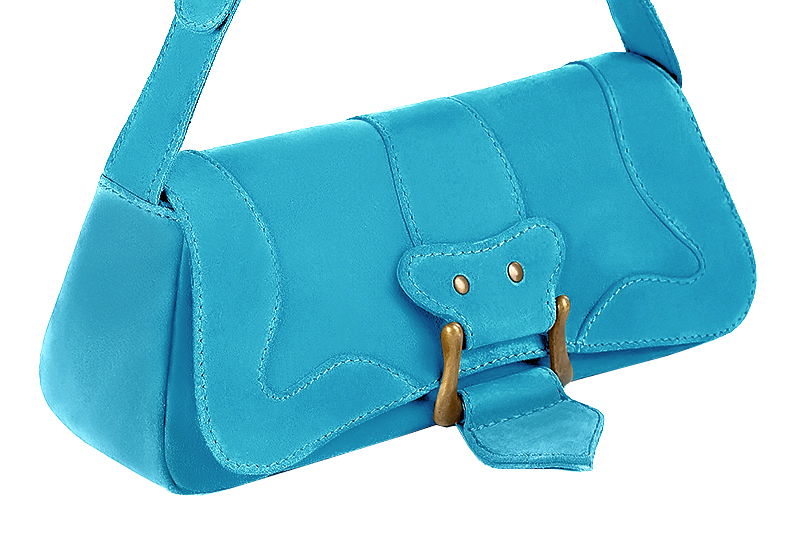 Handcrafted women's small luxurious elegant handbag in premium turquoise blue leather. Perfect for elevated everyday style.   
                Choose from our luxurious collections of leather and fabric to perfectly match your handbags to your outfits.